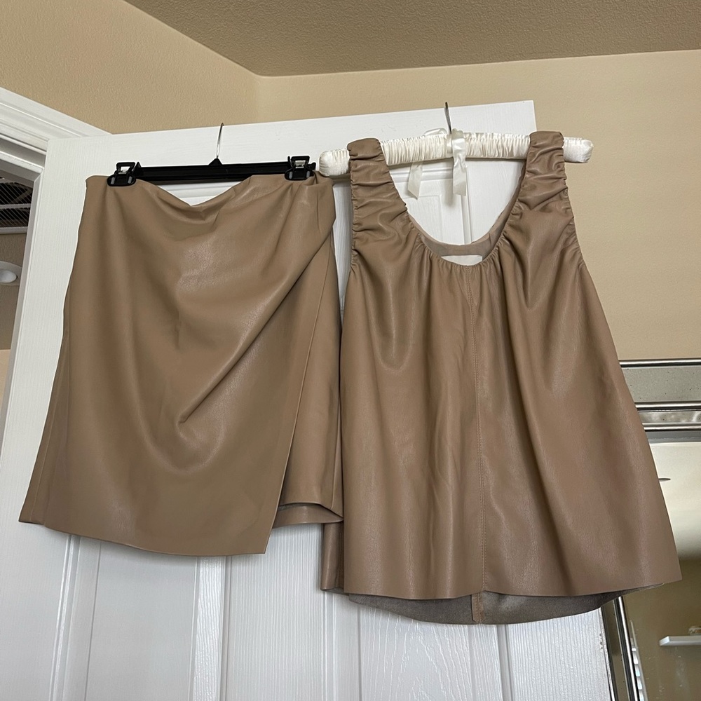 Nanushka vegan leather skirt and top, soft buttery fabric dry clean only.